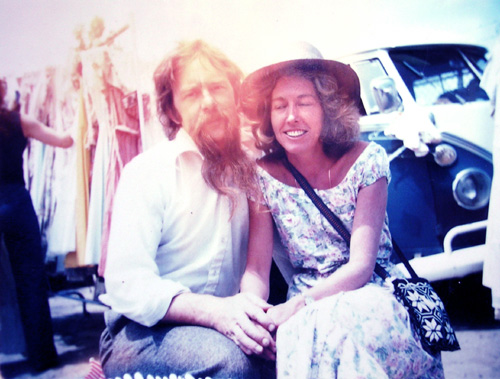 Cove and Maya photographed beside their old VW bus in the 1970s