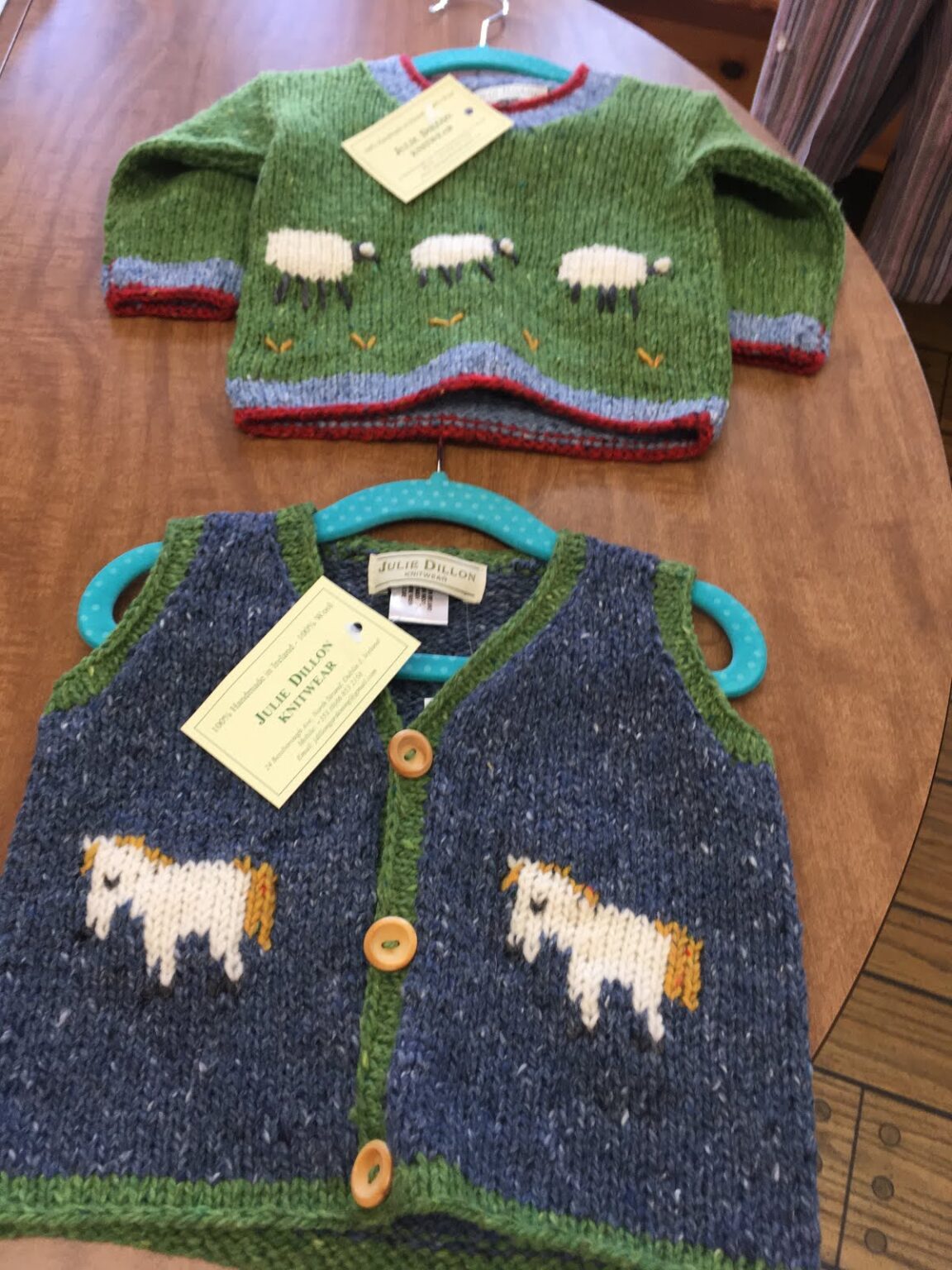 Julie Dillon hand knit children&rsquo;s cardigan in green wool
