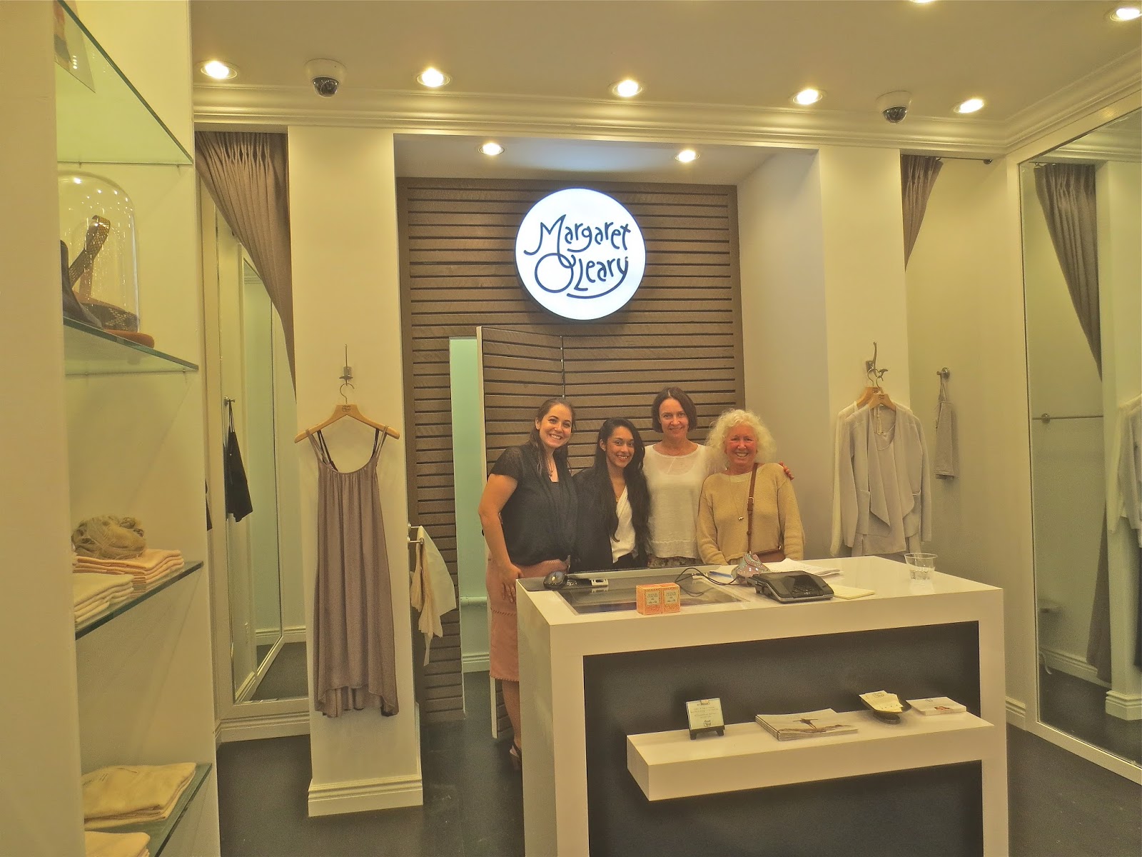 Margaret O’Leary with Maya and the staff of New York store.